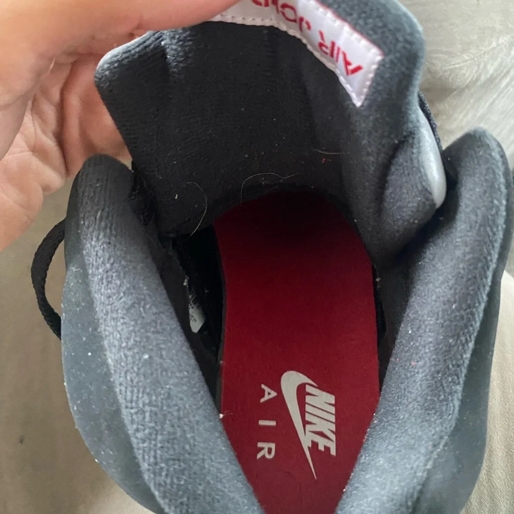 Jordan Men's Athletic Shoes in Black with Red Accents